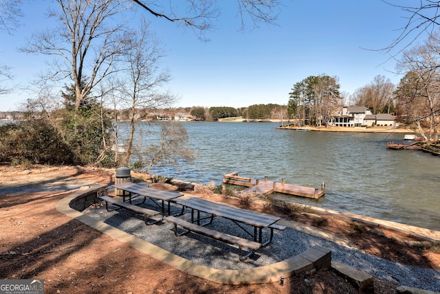 exterior space with a water view