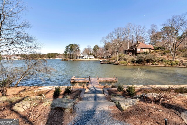 view of dock with a water view