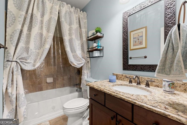 bathroom featuring toilet, shower / bath combo, vanity, and tile patterned flooring