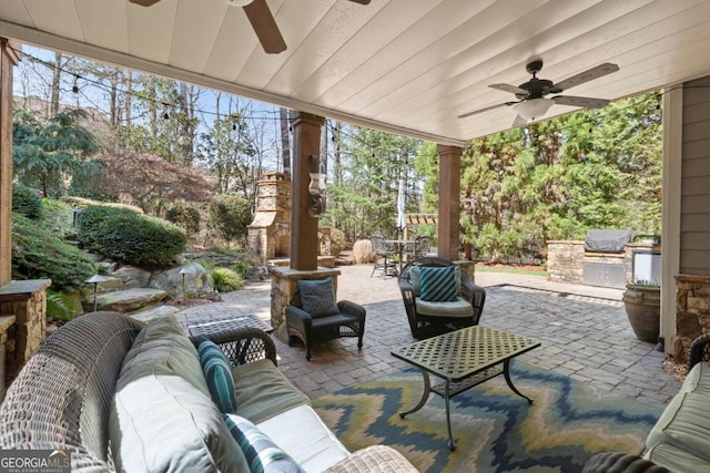 view of patio / terrace featuring grilling area, exterior kitchen, outdoor lounge area, and outdoor dining area