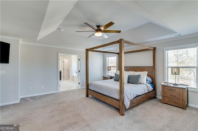 bedroom with visible vents, crown molding, baseboards, light colored carpet, and a ceiling fan