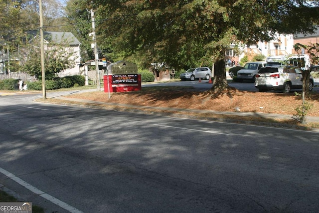 view of road featuring curbs and sidewalks