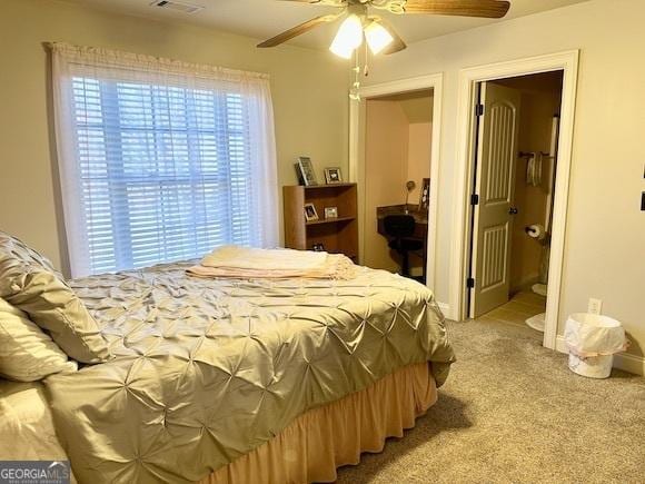 bedroom with baseboards, light carpet, and ceiling fan