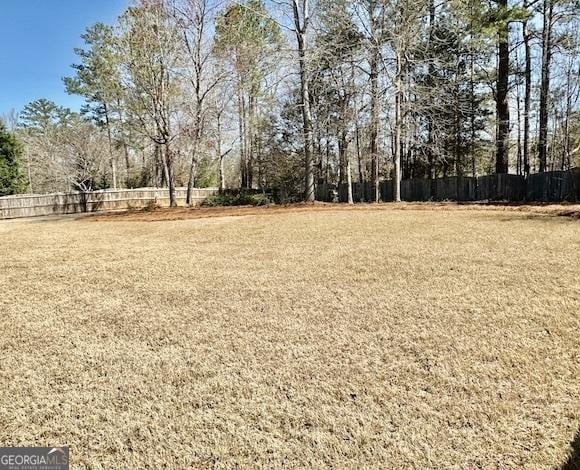 view of yard with fence