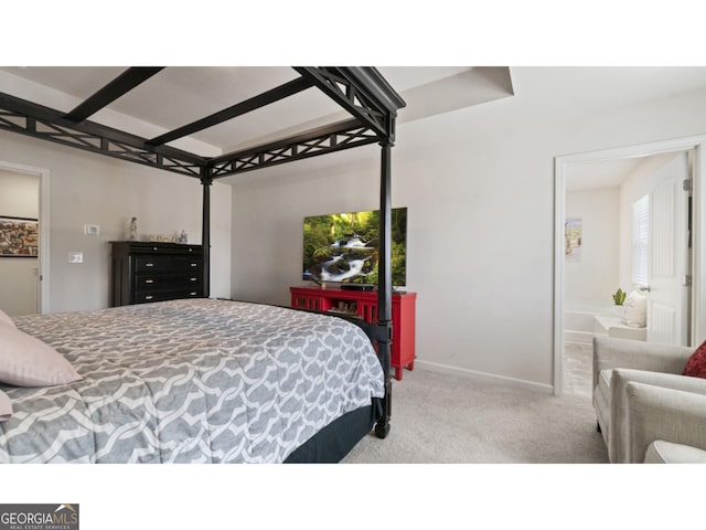 bedroom with baseboards and carpet flooring