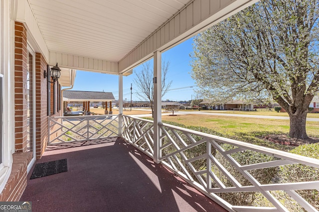 view of patio / terrace with a balcony