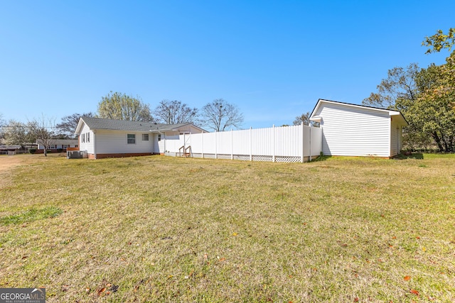 view of yard featuring fence