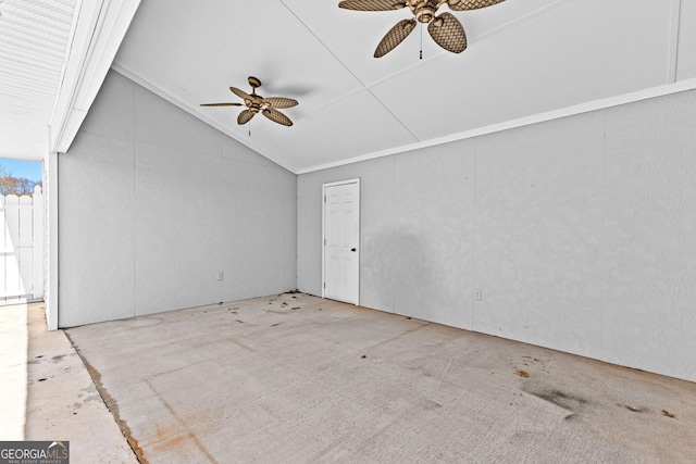 interior space with lofted ceiling and a ceiling fan