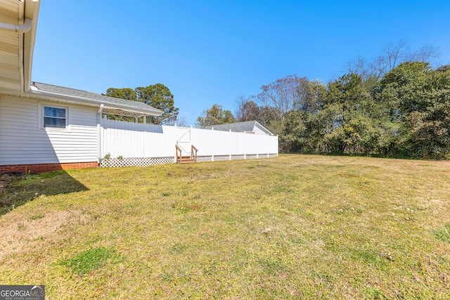 view of yard with fence