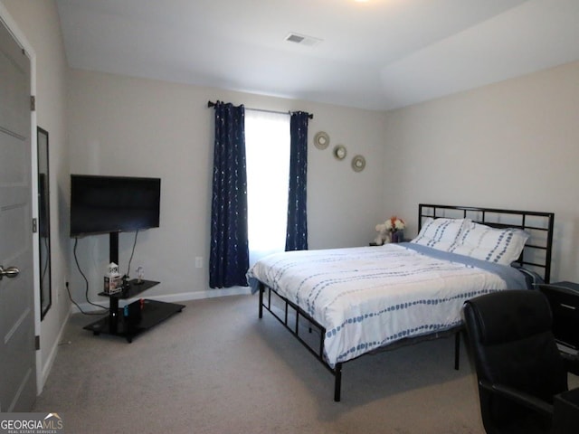 bedroom with baseboards, visible vents, and carpet floors