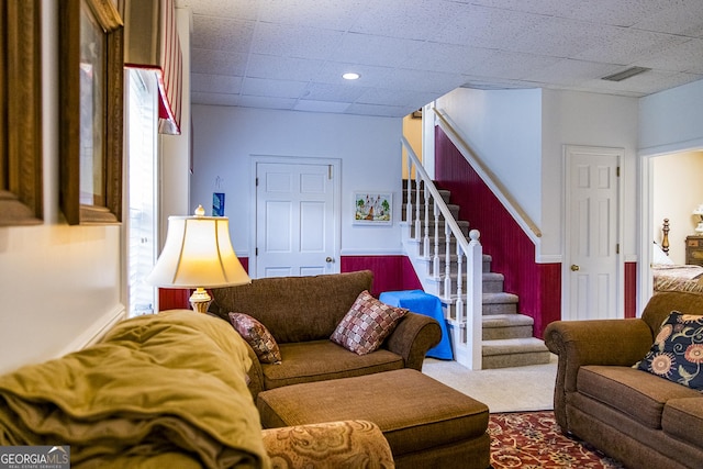 living area with recessed lighting, stairway, carpet floors, and visible vents