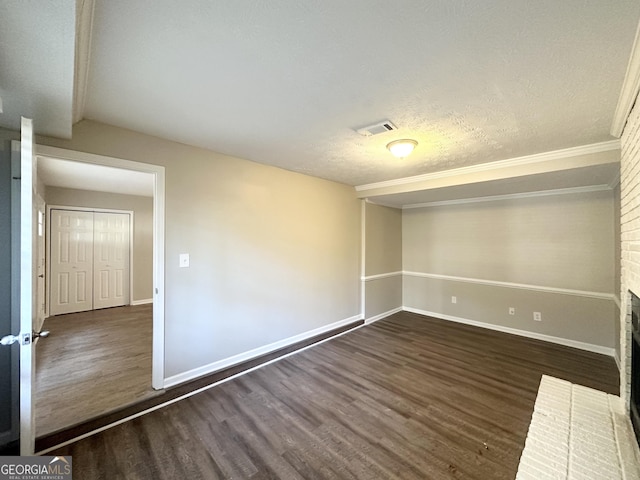 3395 Longleaf Dr, Decatur, GA 30032 - unfurnished room featuring a fireplace, wood finished floors, visible vents, and baseboards