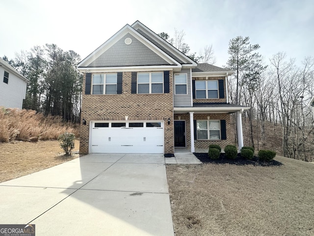 craftsman house featuring a garage, brick siding, and concrete driveway