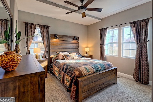 bedroom with baseboards, carpet, and a ceiling fan