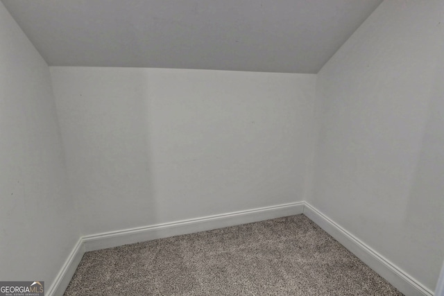 bonus room with baseboards, carpet flooring, and vaulted ceiling