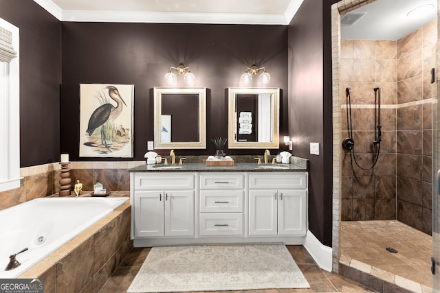 full bathroom featuring a sink, visible vents, tiled shower, and a jetted tub