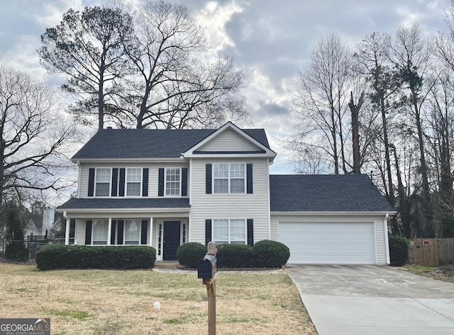 view of front of house with fence, concrete driveway, a front yard, a shingled roof, and a garage