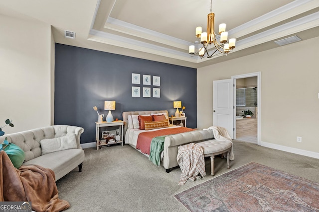 bedroom with visible vents, carpet flooring, baseboards, and a tray ceiling