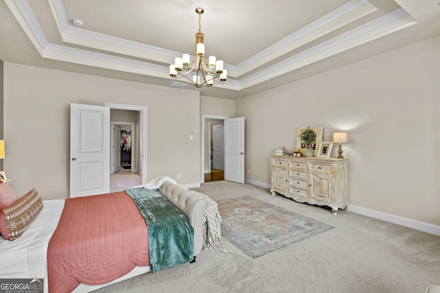 carpeted bedroom featuring crown molding, a raised ceiling, and baseboards