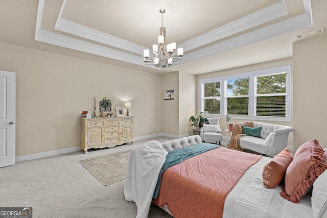 bedroom with visible vents, light carpet, a tray ceiling, crown molding, and baseboards