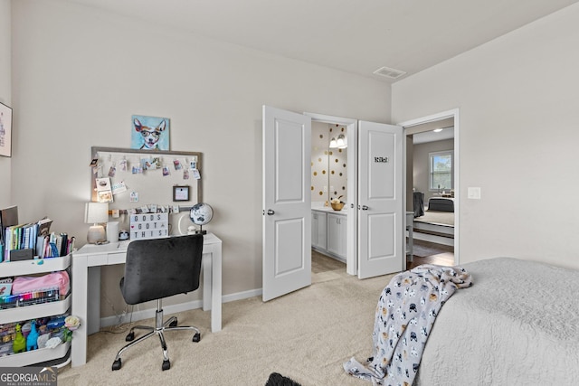 bedroom with light carpet, visible vents, and baseboards