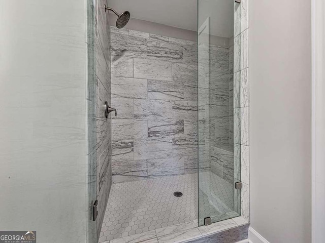 bathroom featuring a shower stall