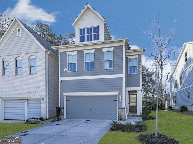 view of front of house featuring brick siding, a garage, driveway, and a front lawn