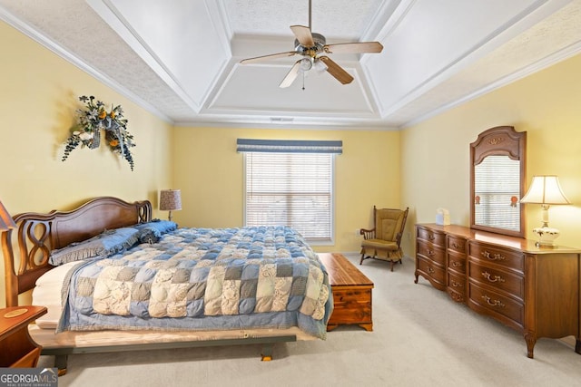 bedroom with a ceiling fan, a raised ceiling, light colored carpet, and crown molding