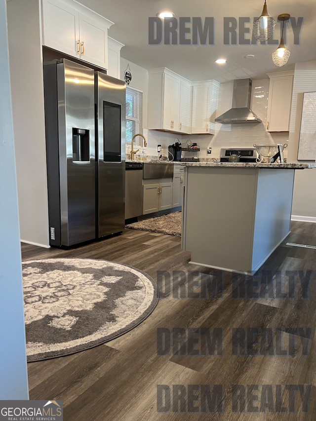 4025 Gretna Dr, Decatur, GA 30035 - kitchen featuring wall chimney range hood, white cabinetry, backsplash, and appliances with stainless steel finishes