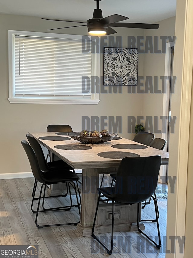 4025 Gretna Dr, Decatur, GA 30035 - dining area featuring ceiling fan, wood finished floors, and baseboards