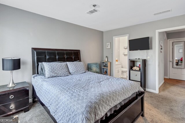 5545 Circlestone Ln, Stone Mountain, GA 30083 - bedroom featuring ensuite bath, visible vents, baseboards, and carpet