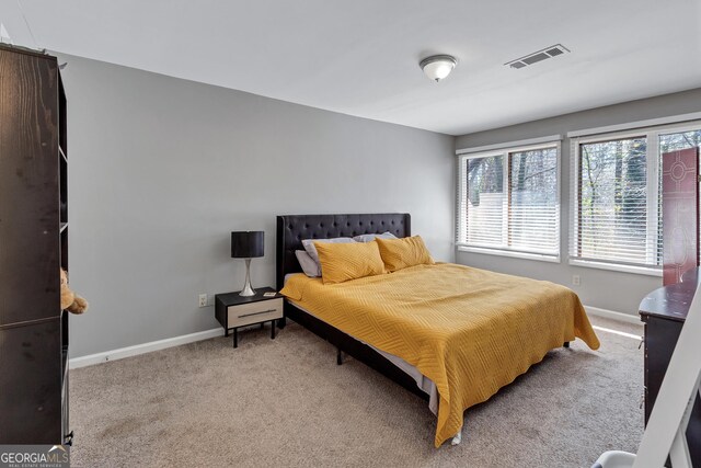5545 Circlestone Ln, Stone Mountain, GA 30083 - bedroom featuring visible vents, baseboards, and carpet flooring