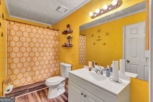 5545 Circlestone Ln, Stone Mountain, GA 30083 - full bathroom with a textured ceiling, wood finished floors, vanity, and ornamental molding