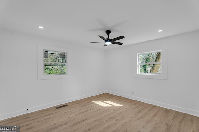 926 Natham Dr SE, Atlanta, GA 30315 - unfurnished room with baseboards, visible vents, light wood-style flooring, and recessed lighting