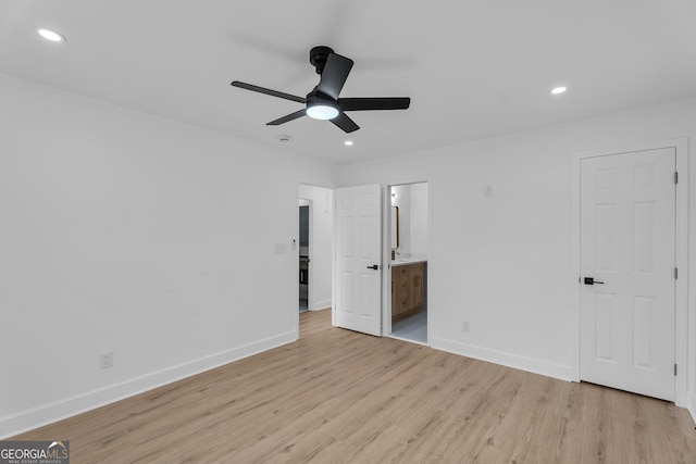 926 Natham Dr SE, Atlanta, GA 30315 - unfurnished bedroom with baseboards, ensuite bath, light wood-style flooring, and recessed lighting