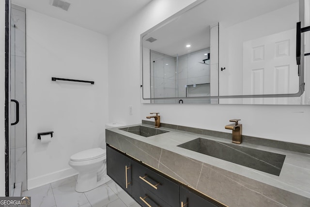 926 Natham Dr SE, Atlanta, GA 30315 - bathroom featuring marble finish floor, visible vents, a sink, and a stall shower