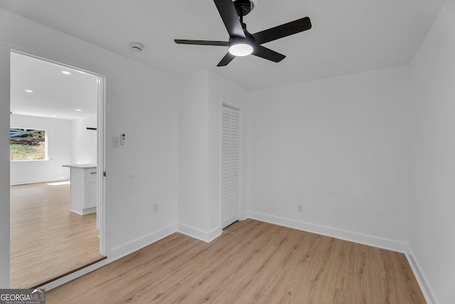 926 Natham Dr SE, Atlanta, GA 30315 - empty room with baseboards, light wood-type flooring, and ceiling fan