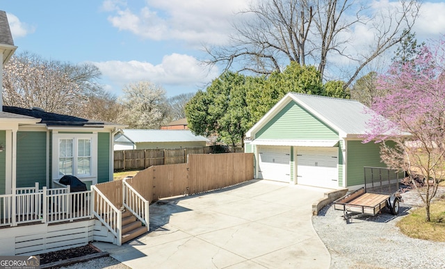 garage featuring fence