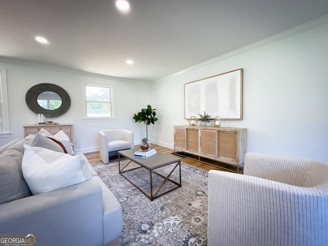 living room with crown molding, recessed lighting, and wood finished floors