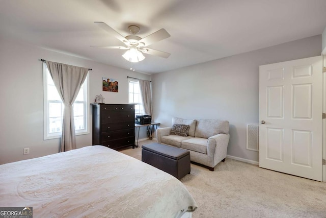 bedroom featuring baseboards, visible vents, carpet floors, and ceiling fan