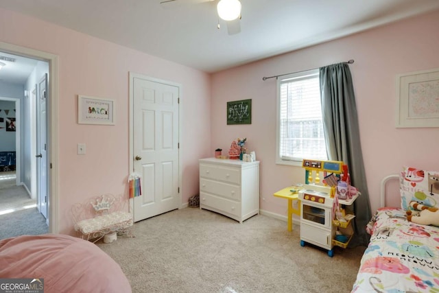 bedroom with visible vents, baseboards, ceiling fan, and carpet floors