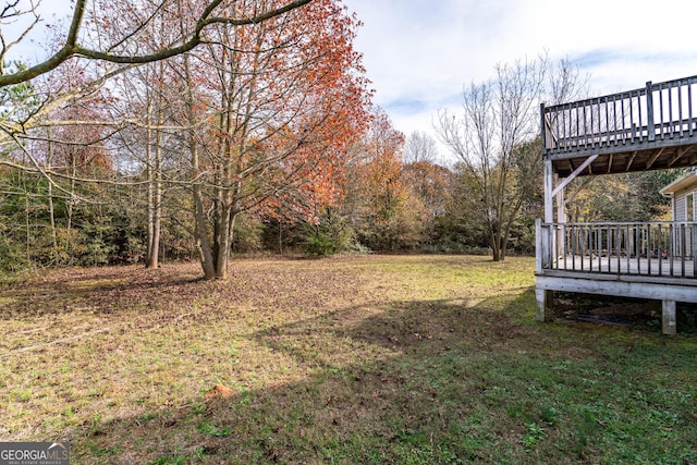 view of yard with a deck