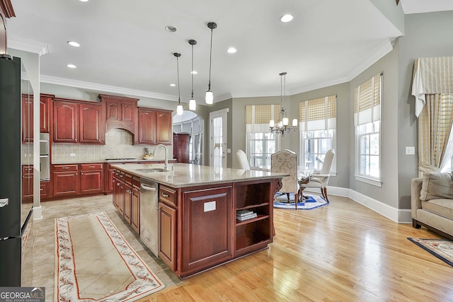 kitchen featuring light wood-style flooring, ornamental molding, a sink, backsplash, and reddish brown cabinets