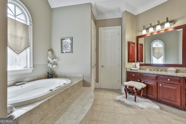 bathroom with vanity, a bath, tile patterned flooring, and ornamental molding