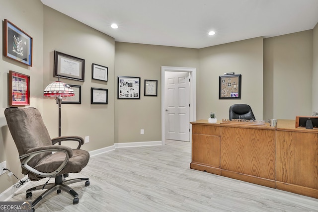 office area featuring recessed lighting, light wood-type flooring, and baseboards