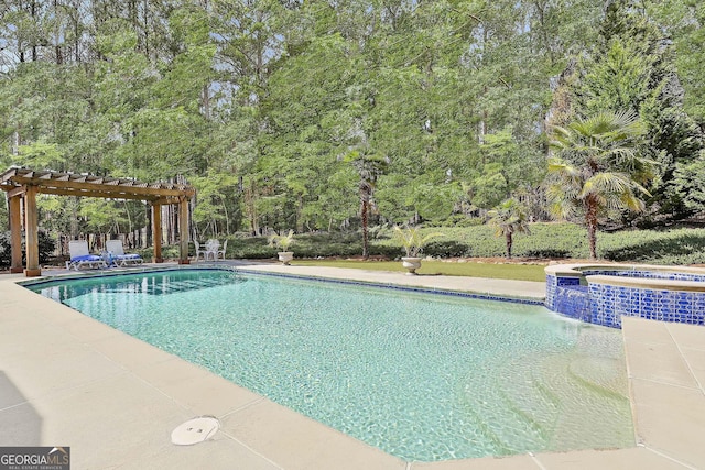 view of pool with a patio area, a pergola, and a pool with connected hot tub