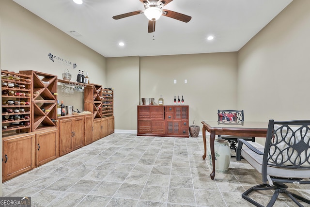 office featuring a ceiling fan, visible vents, recessed lighting, and baseboards