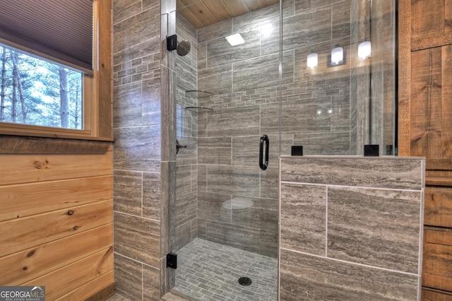 bathroom featuring a shower stall