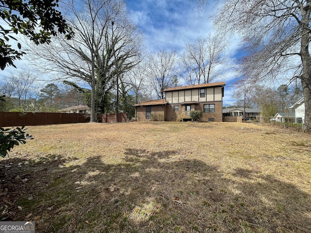 view of yard featuring fence