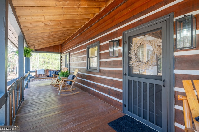 wooden terrace with covered porch